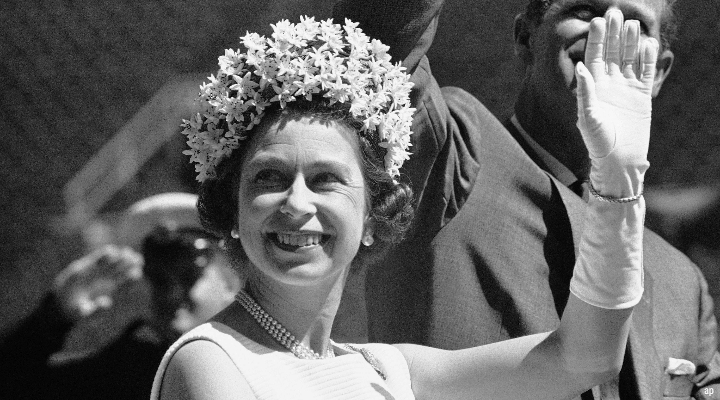 Young Queen Elizabeth waving