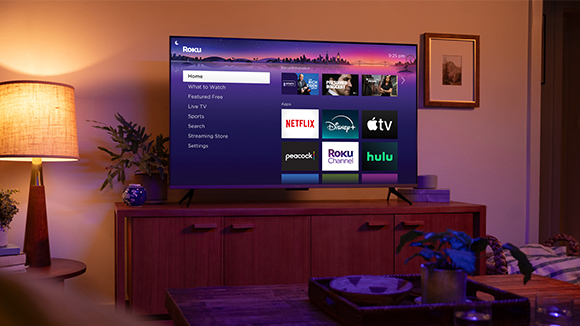 TV with the Roku UI screen in a family room