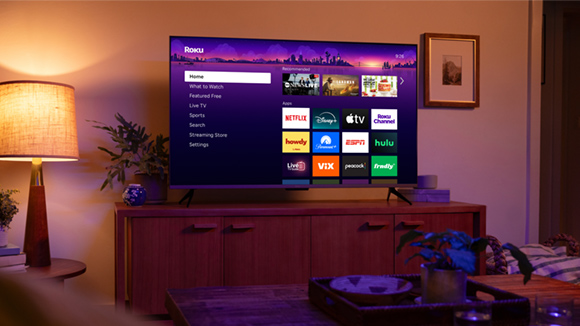 TV with the Roku UI screen in a family room