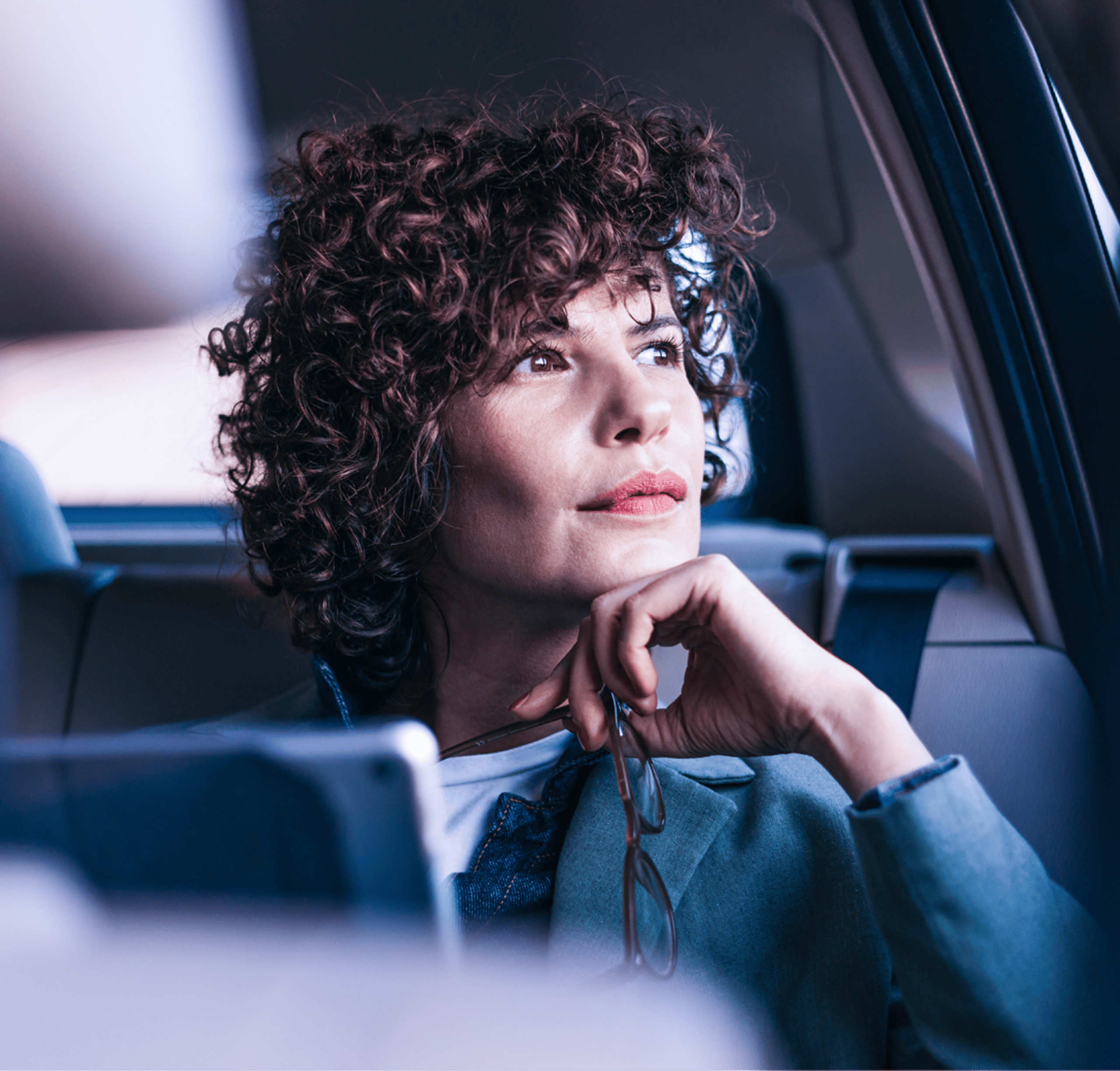 O-15-image-card-grid-cloud-native-brand-image-woman-in-car.webp