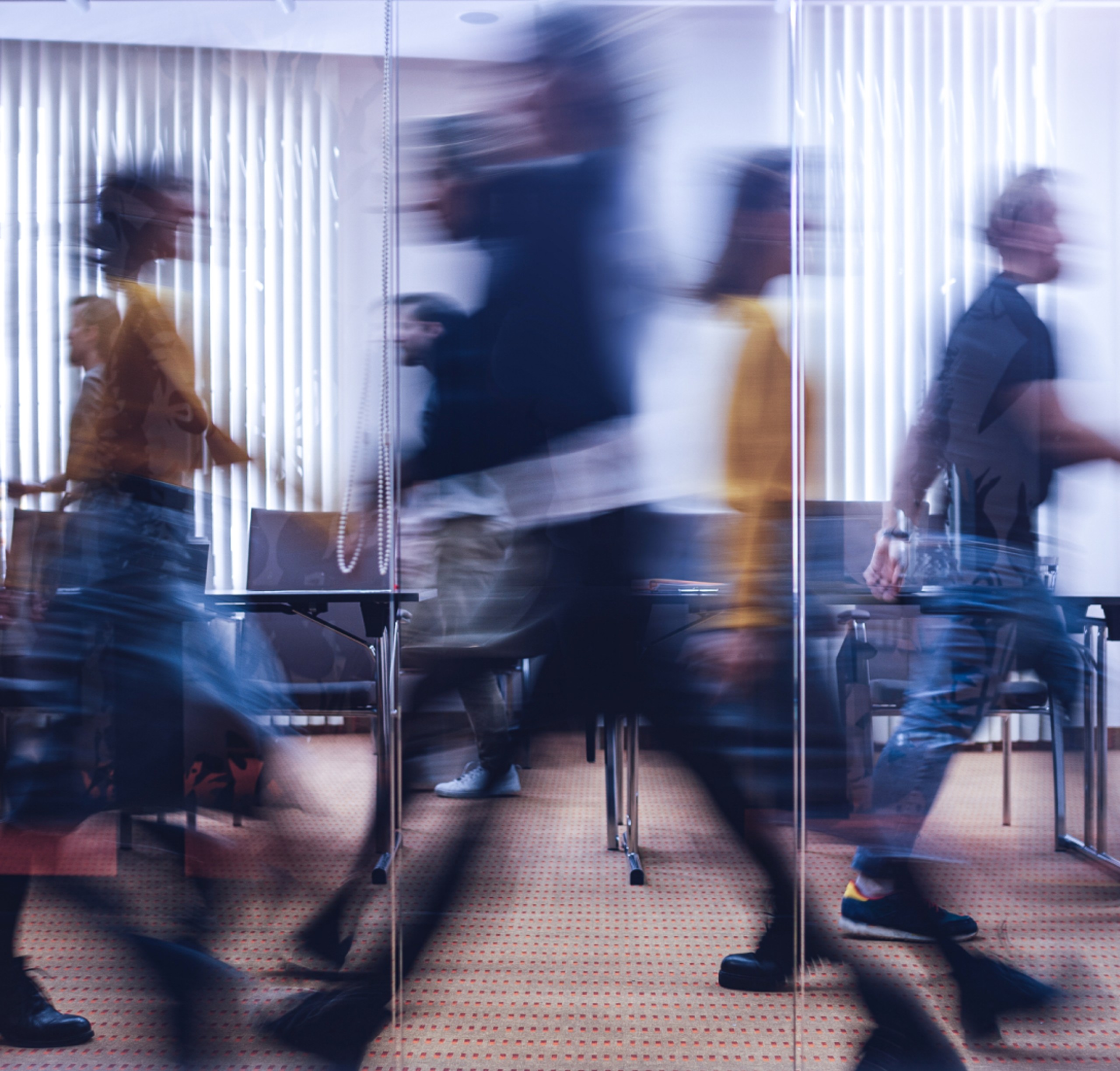 O-14-tabbed-content-XDR-brand-image-people-walking-office.webp
