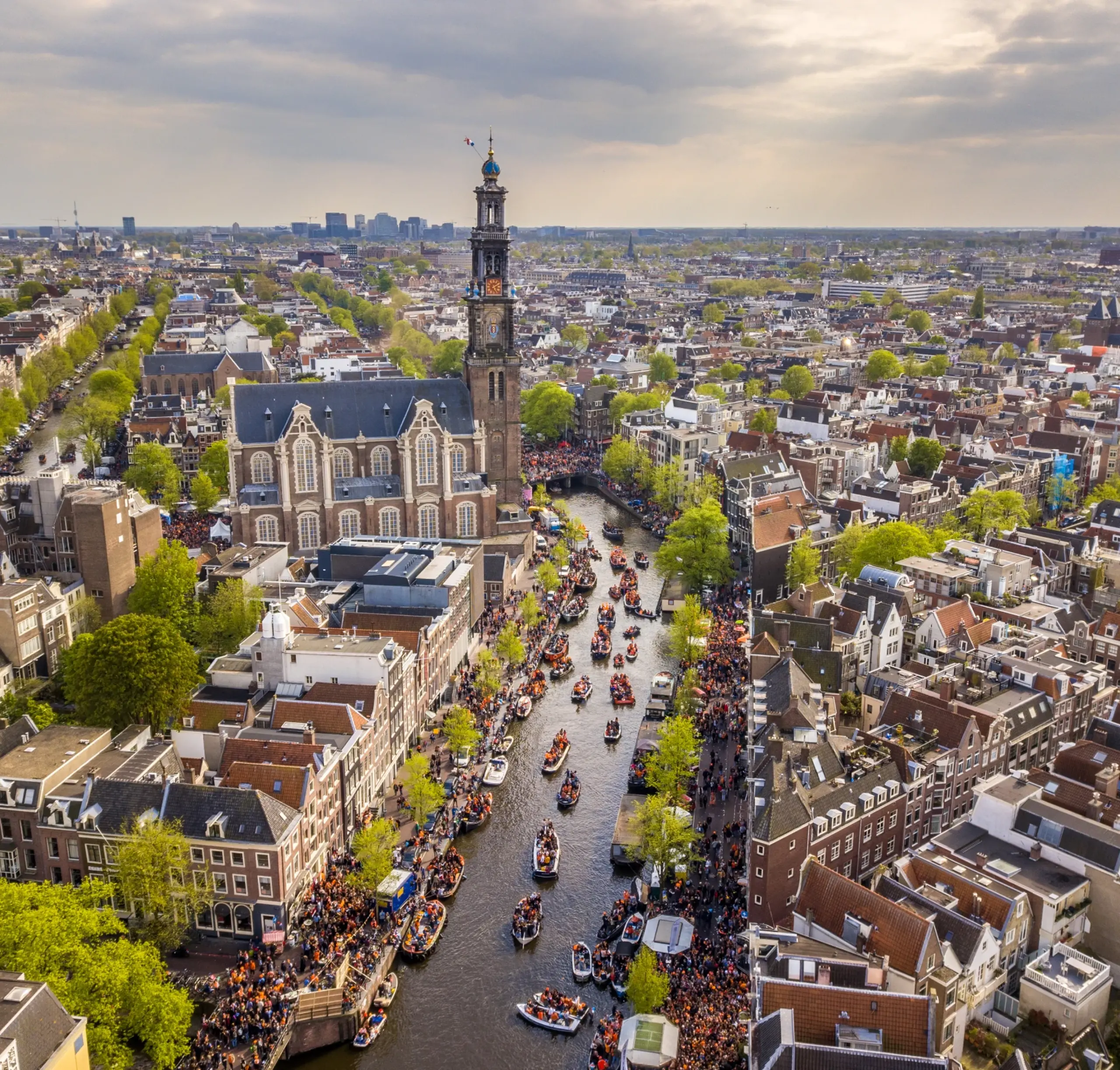 M-08-image-card-amsterdam-aerial-cityscape-river-boats.webp