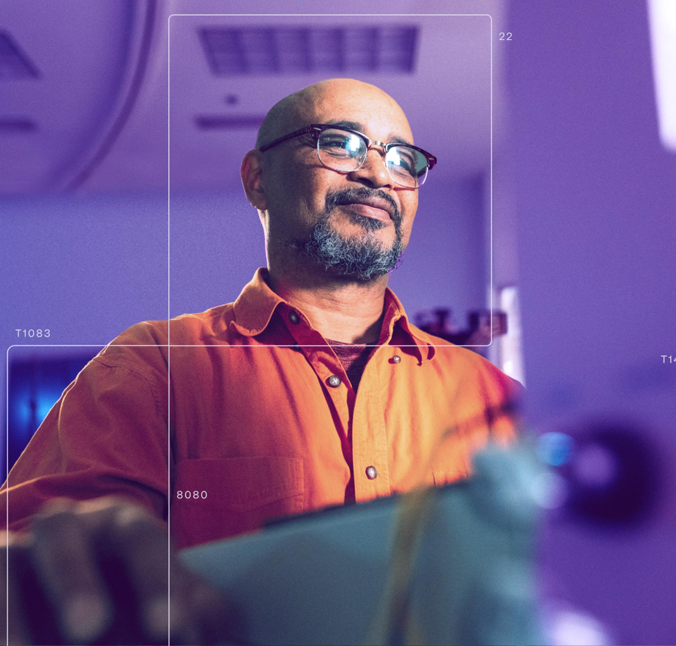 O-14-tabbed-content-cloud-native-smilling-man-with-glasses.webp