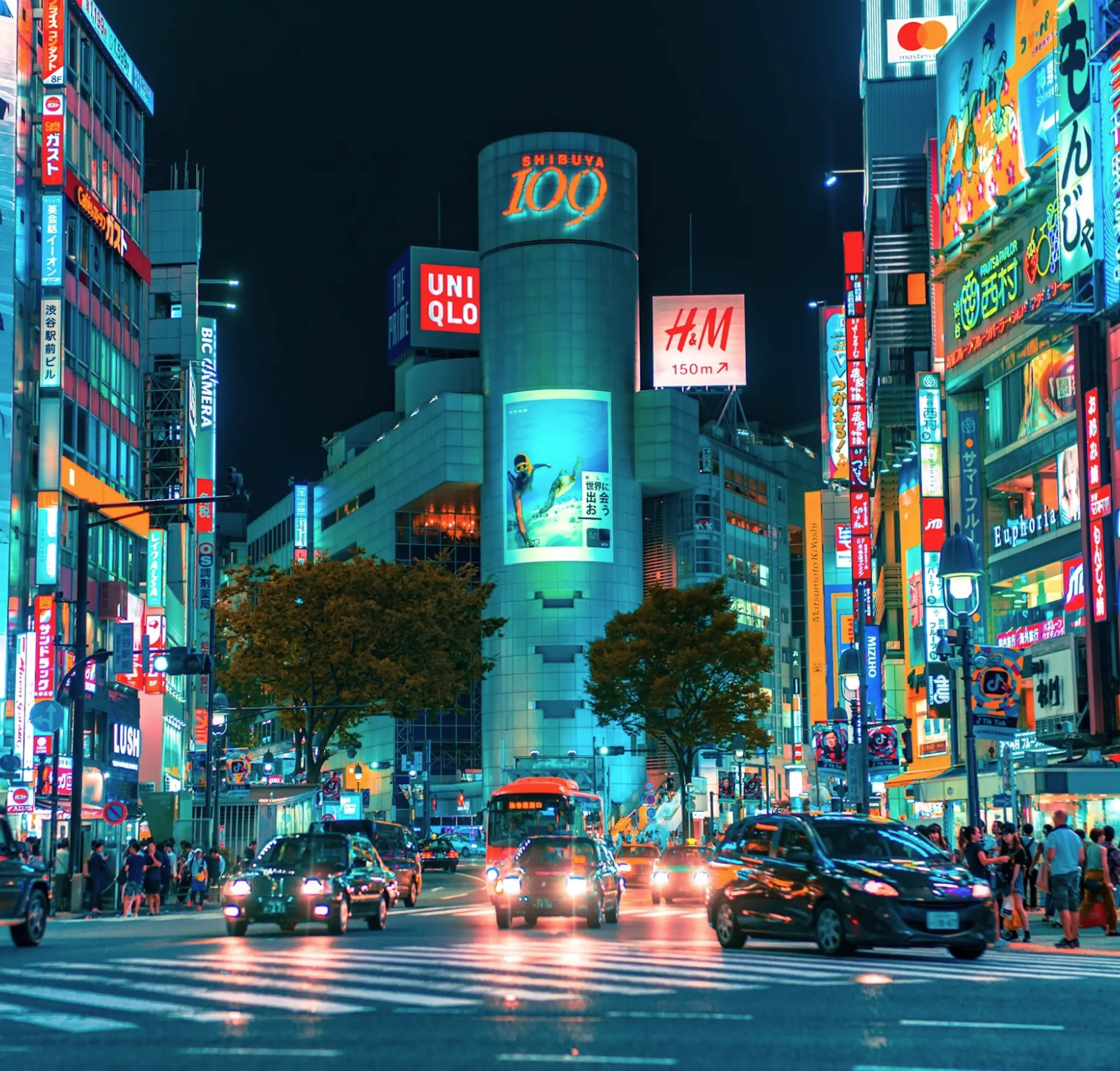 M-08-image-card-tokyo-cityscape-bright-lights-busy-street.webp