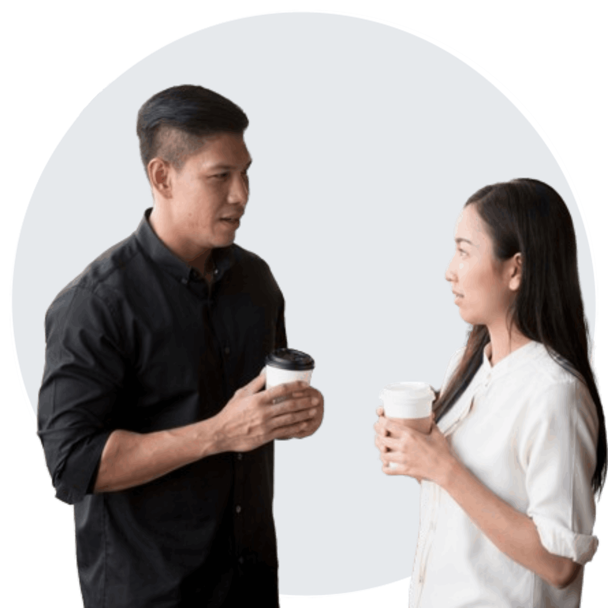 Two young adults having a chat & enjoying coffee at the cafe