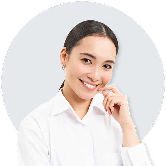 Woman in white shirt smiling brightly