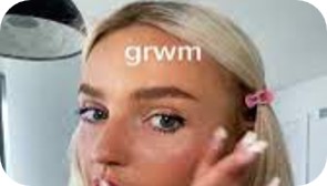 A picture of influencer Morgan with letters GRWM