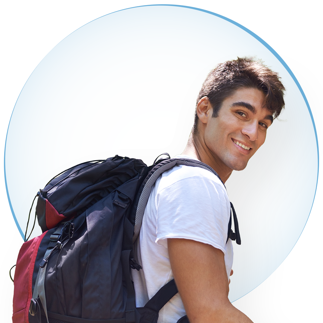 Smiling young man with a black backpack on his back. Smiling young man with a white shirt, carrying a black backpack on his back.