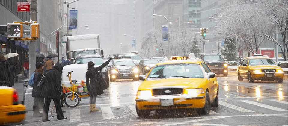 A rainy and busy day in the city.