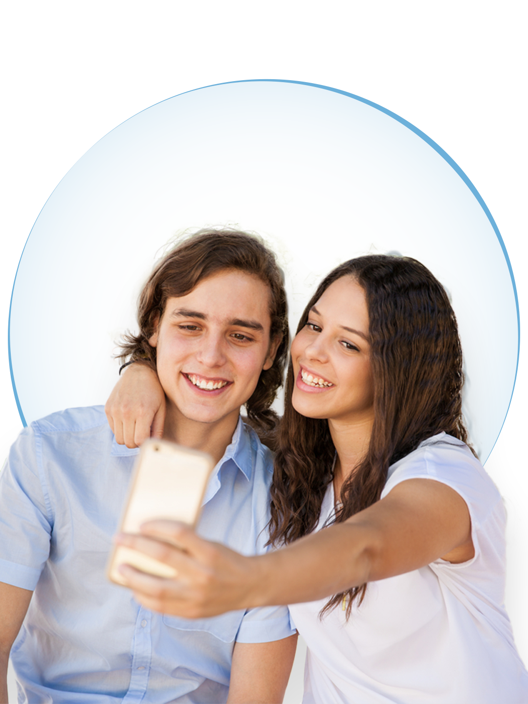 Smiling teenagers taking a selfie with the cellphone she is holding. Teenagers taking a selfie, he wearing a short-sleeved blue shirt with shoulder-length hair, and she wearing a white t-shirt.