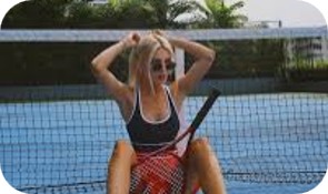Influencer Morgan sitting down from playing tennis