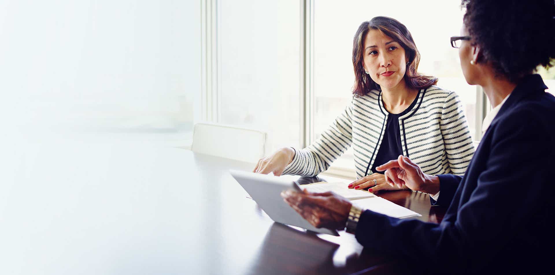 female sales manager addressing a female sales reps individual needs after learning a framework for addressing the different members of her sales team differently.