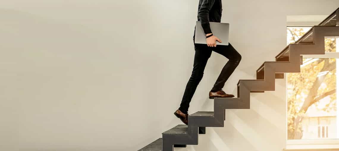 Seller balancing on a narrow path above a gap, representing agile selling.