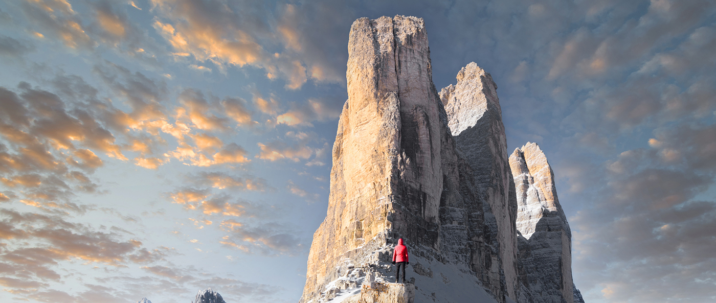 salesperson facing a large mountain face