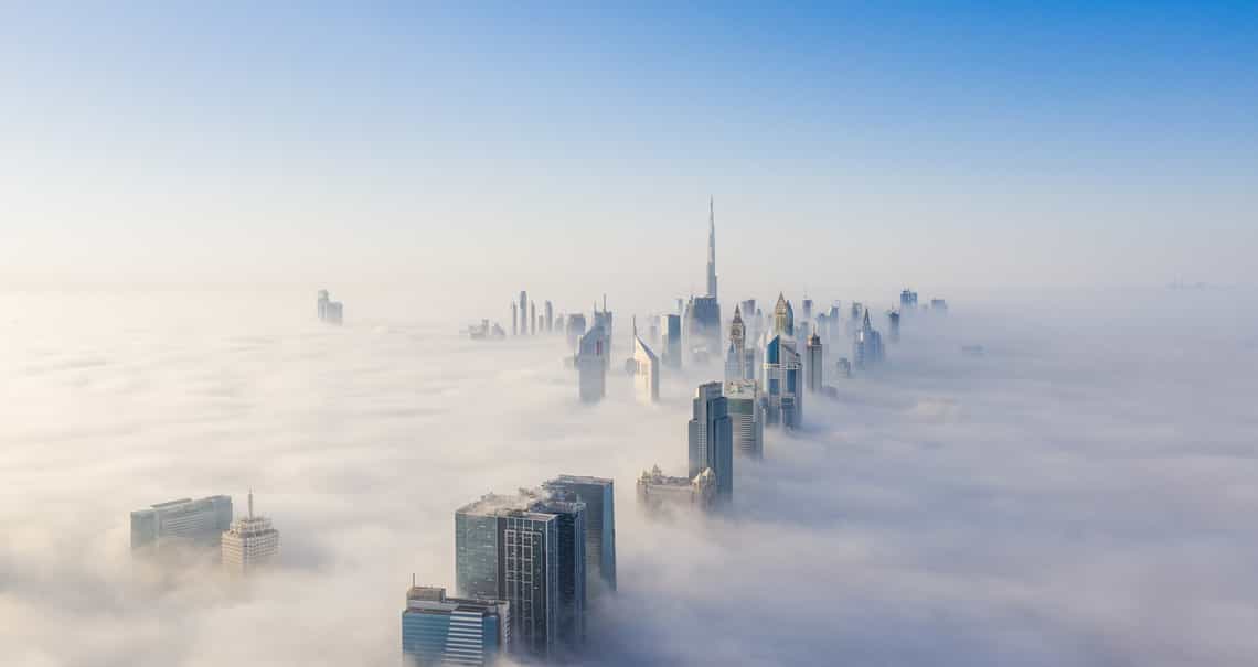areal view of city skyline in fog to represent the uncertainty of selling in h2 of 2023.