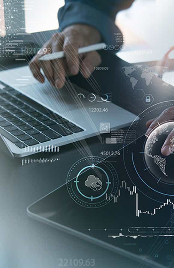picture of a mans hand working on a laptop with graphics coming out of it that show connectivity between data for measurement and analysis