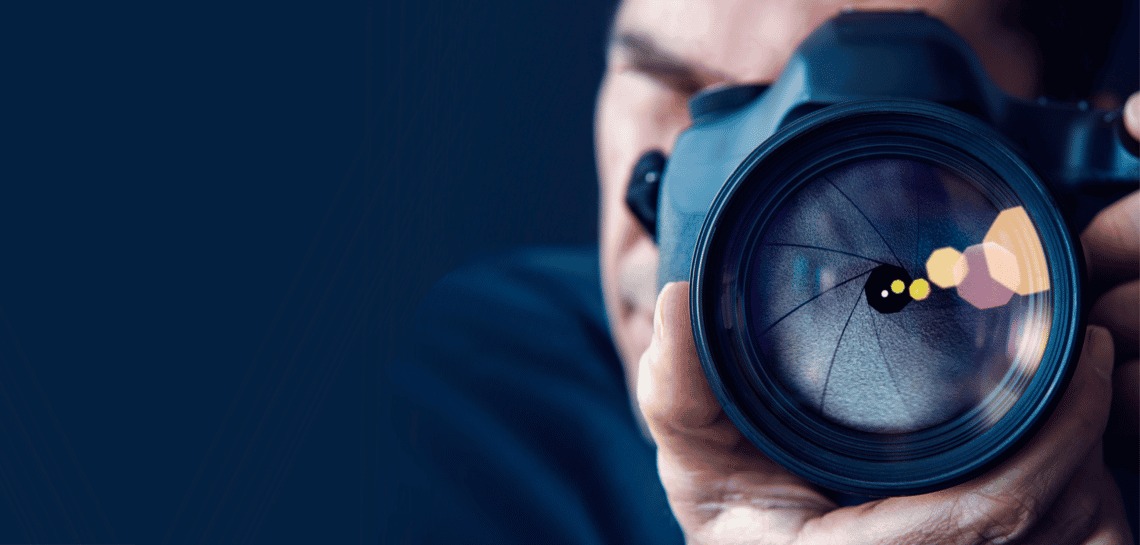 Up close camera lense signifying focusing on existing sales customers