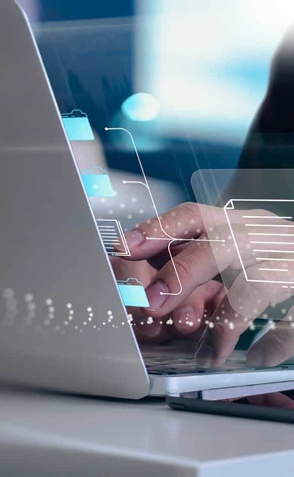 zoomed-in image of a laptop with translucent graphics emanating from it to signify the sales performance dashboard experience.
