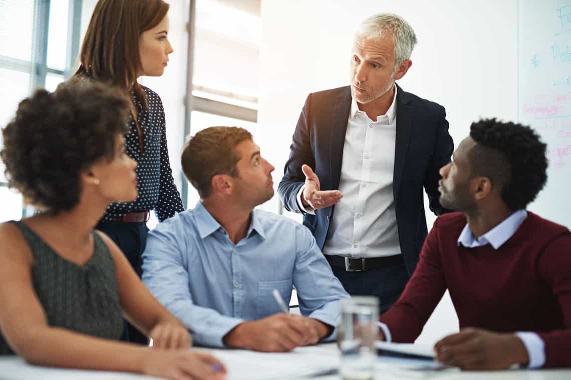 c level executive in sales meeting