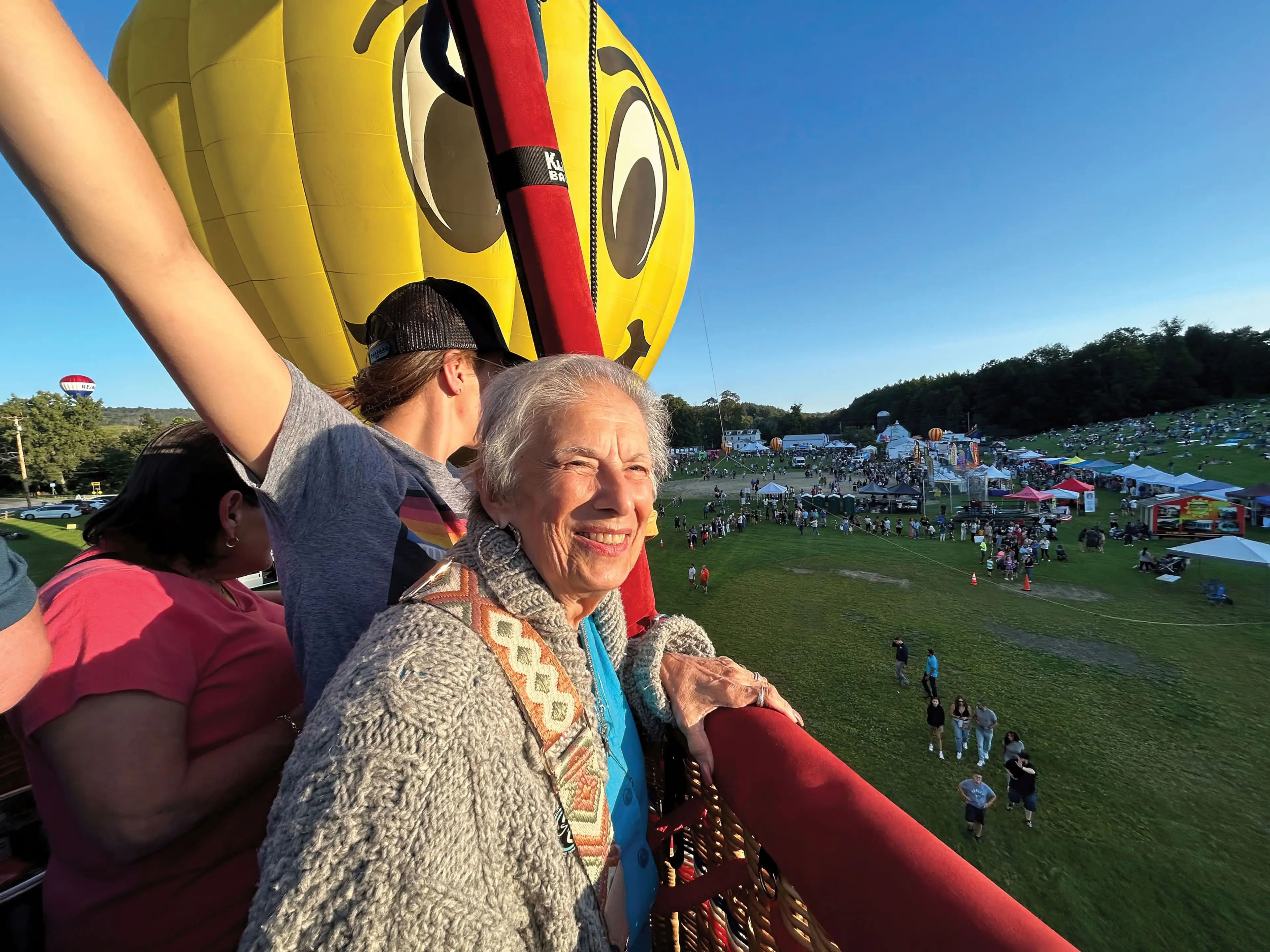 Residents and staff enjoying a hot air balloon ride