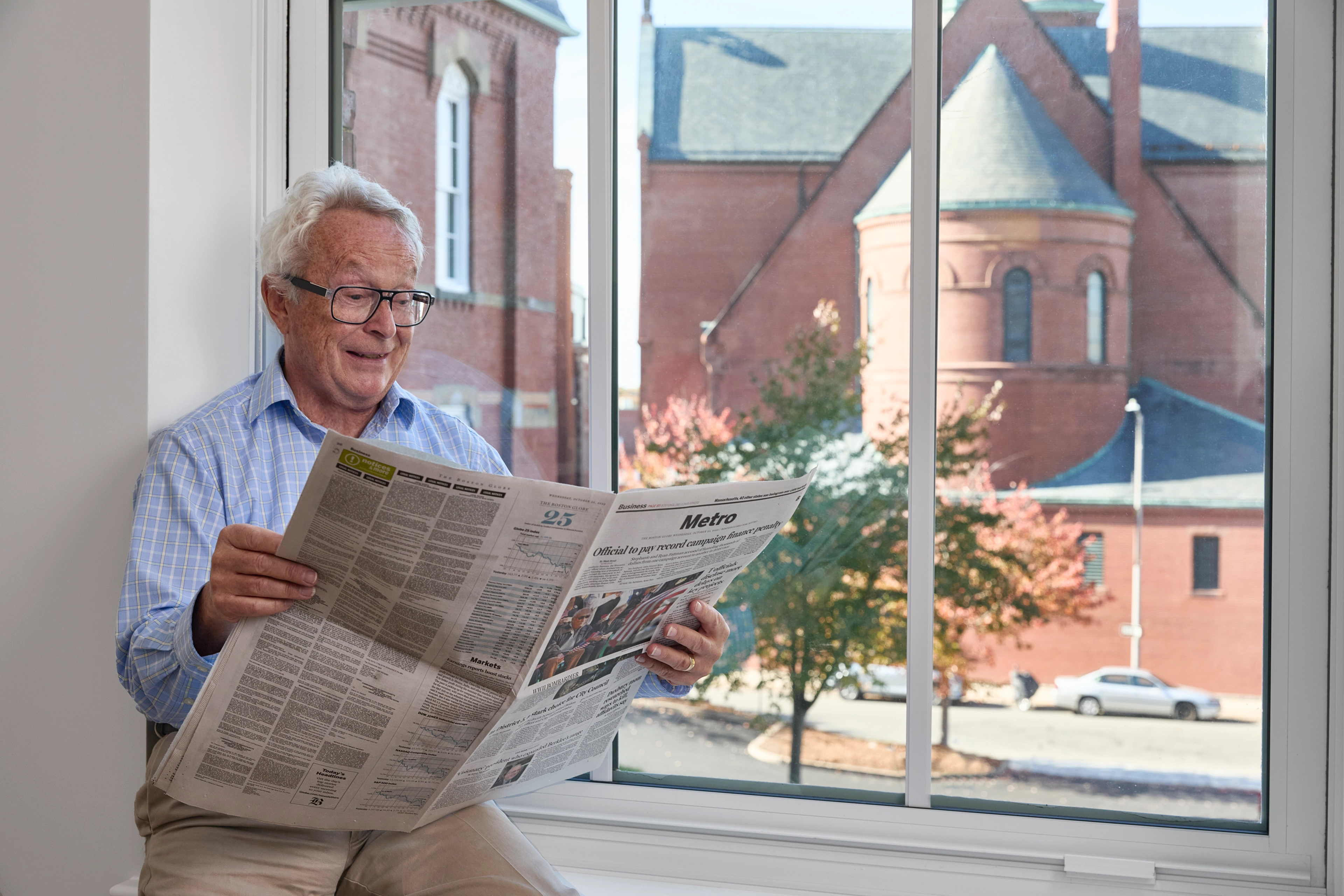 Man Reading Paper