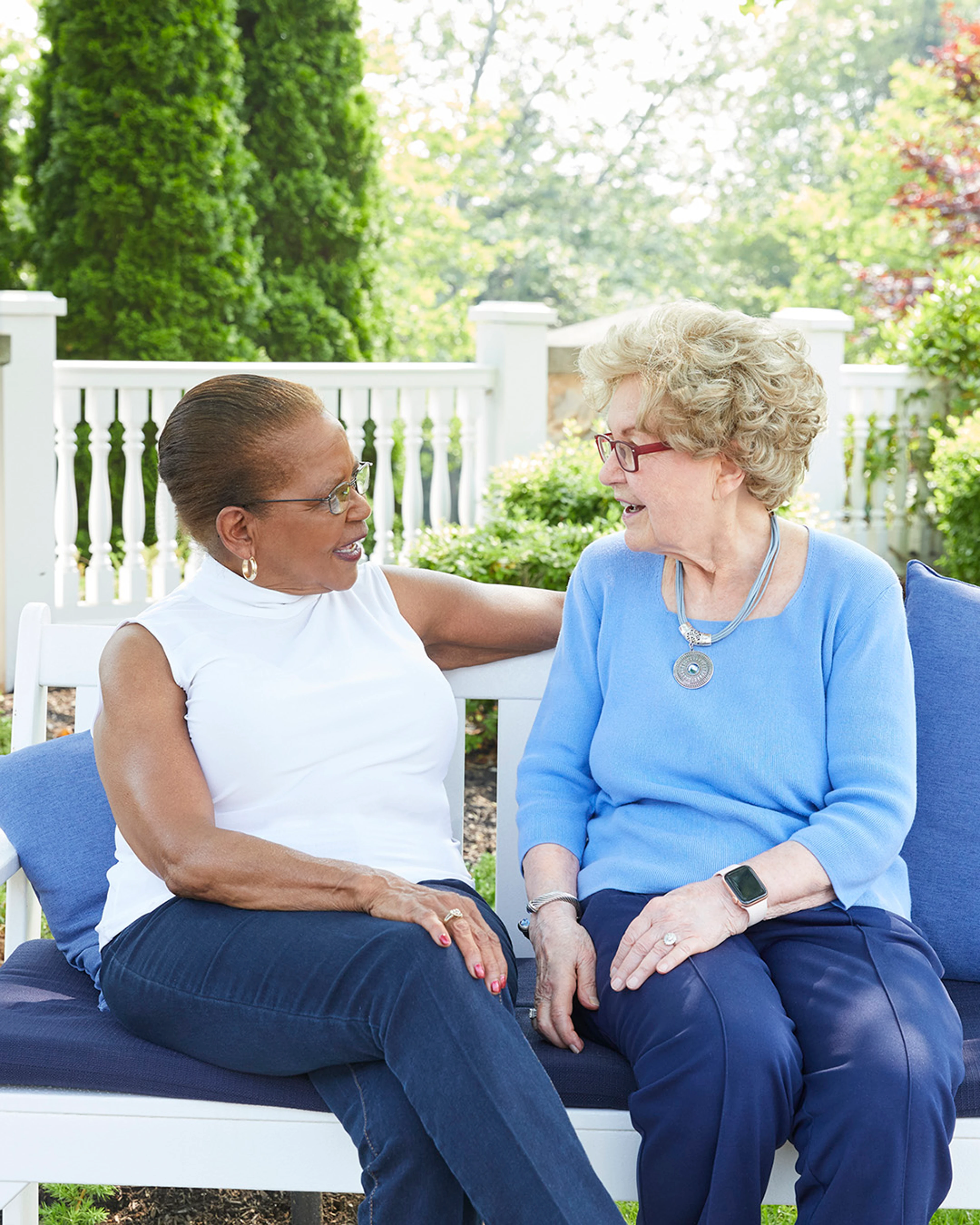 Two senior women laughing 