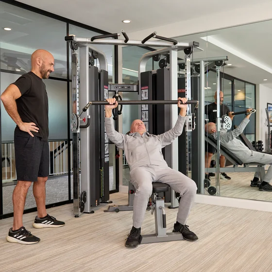 In gym with trainer