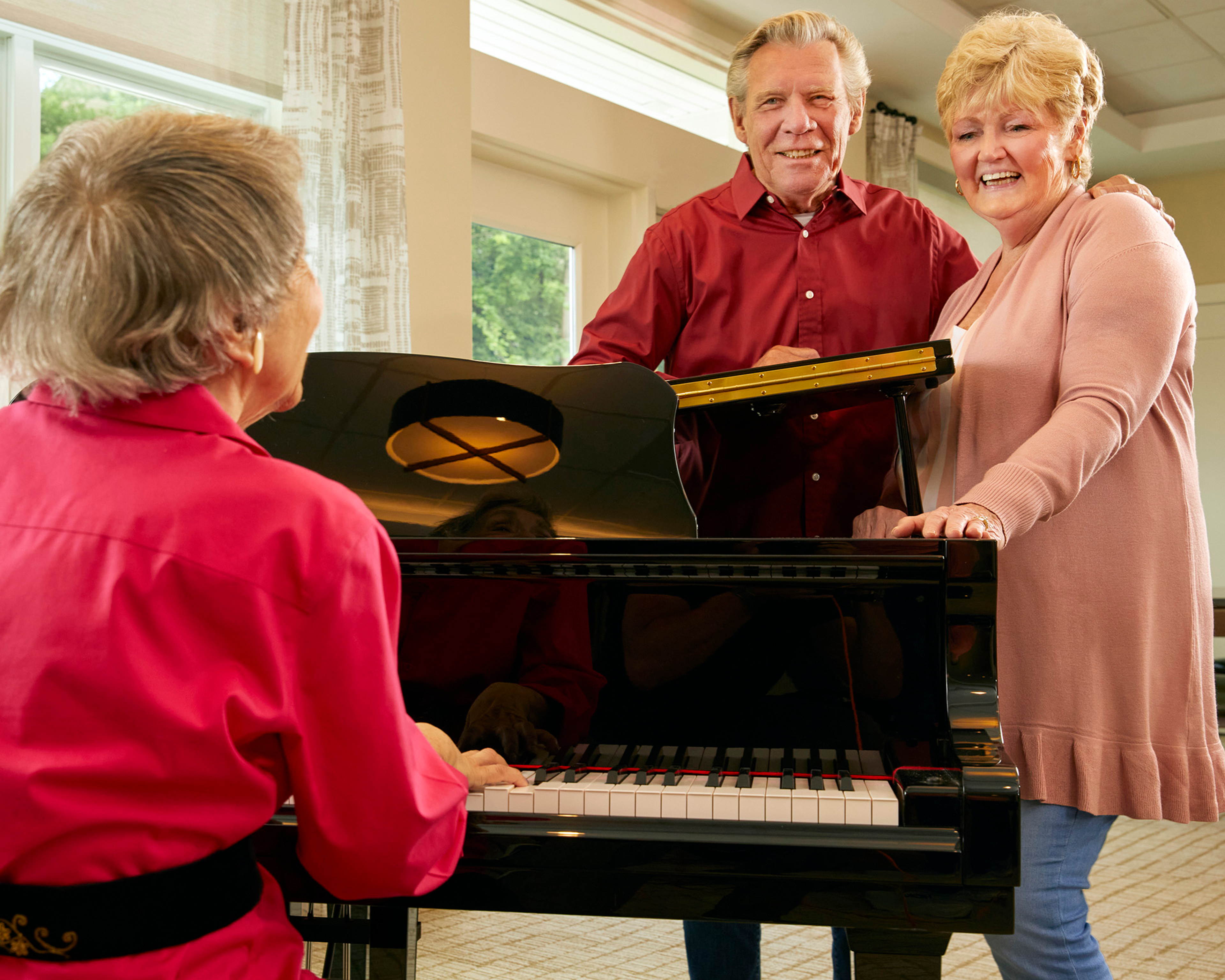 Woman and Couple at Piano