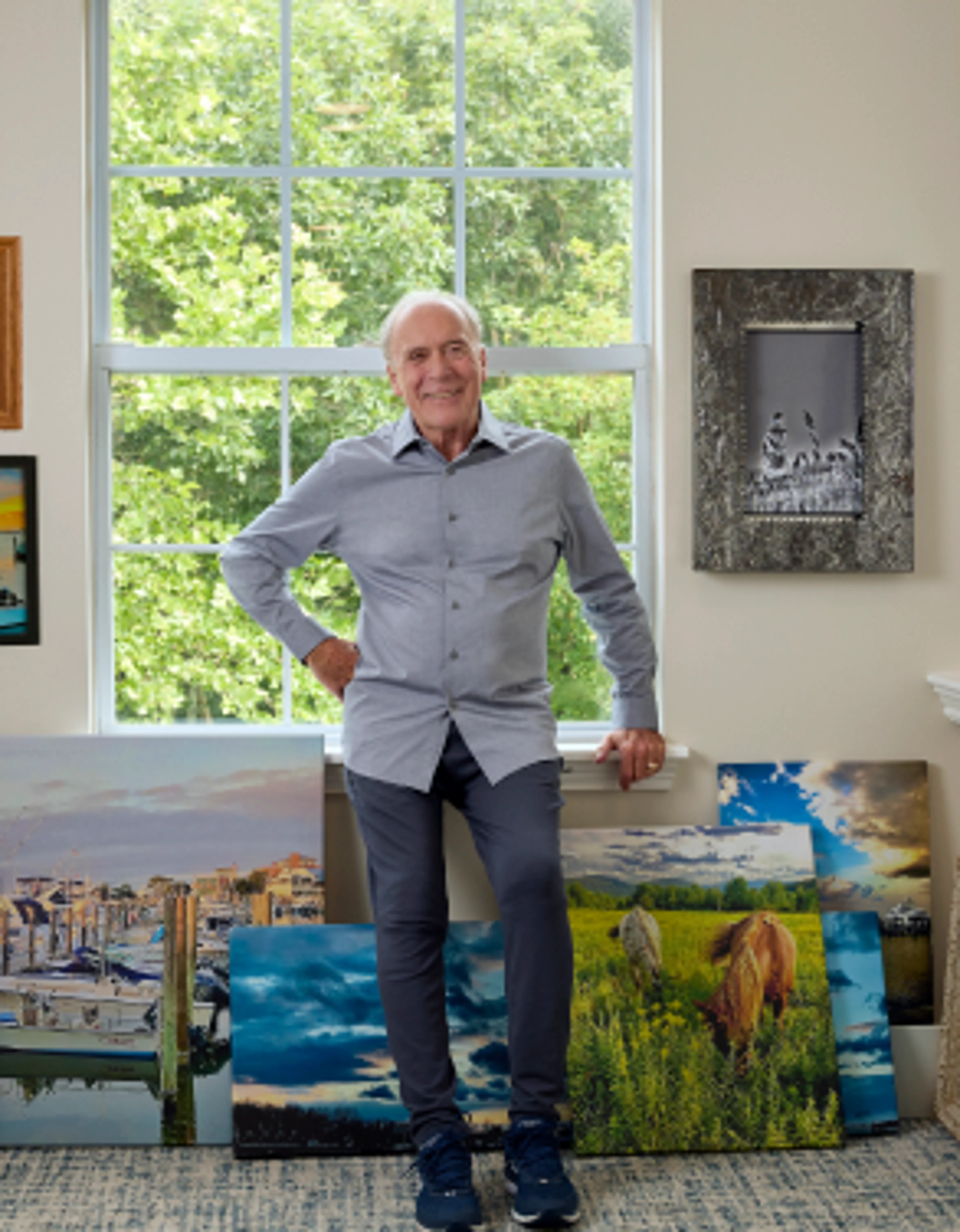 Senior with paintings