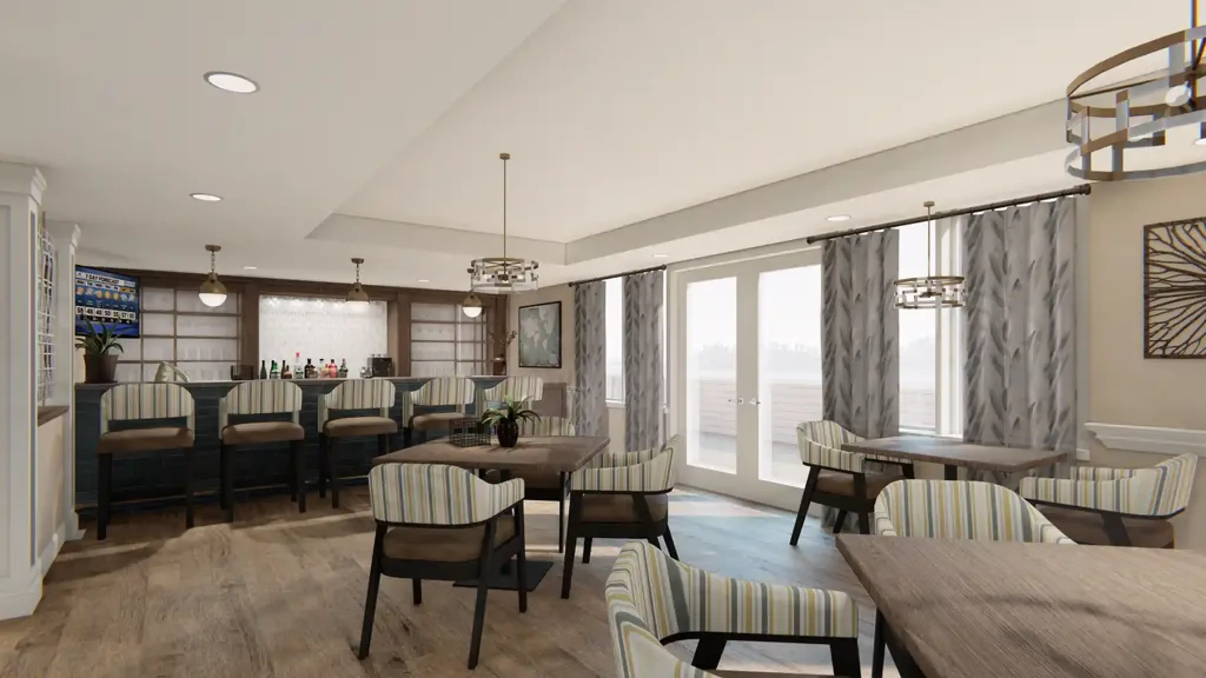 A gathering area with tables and glass doors to a deck