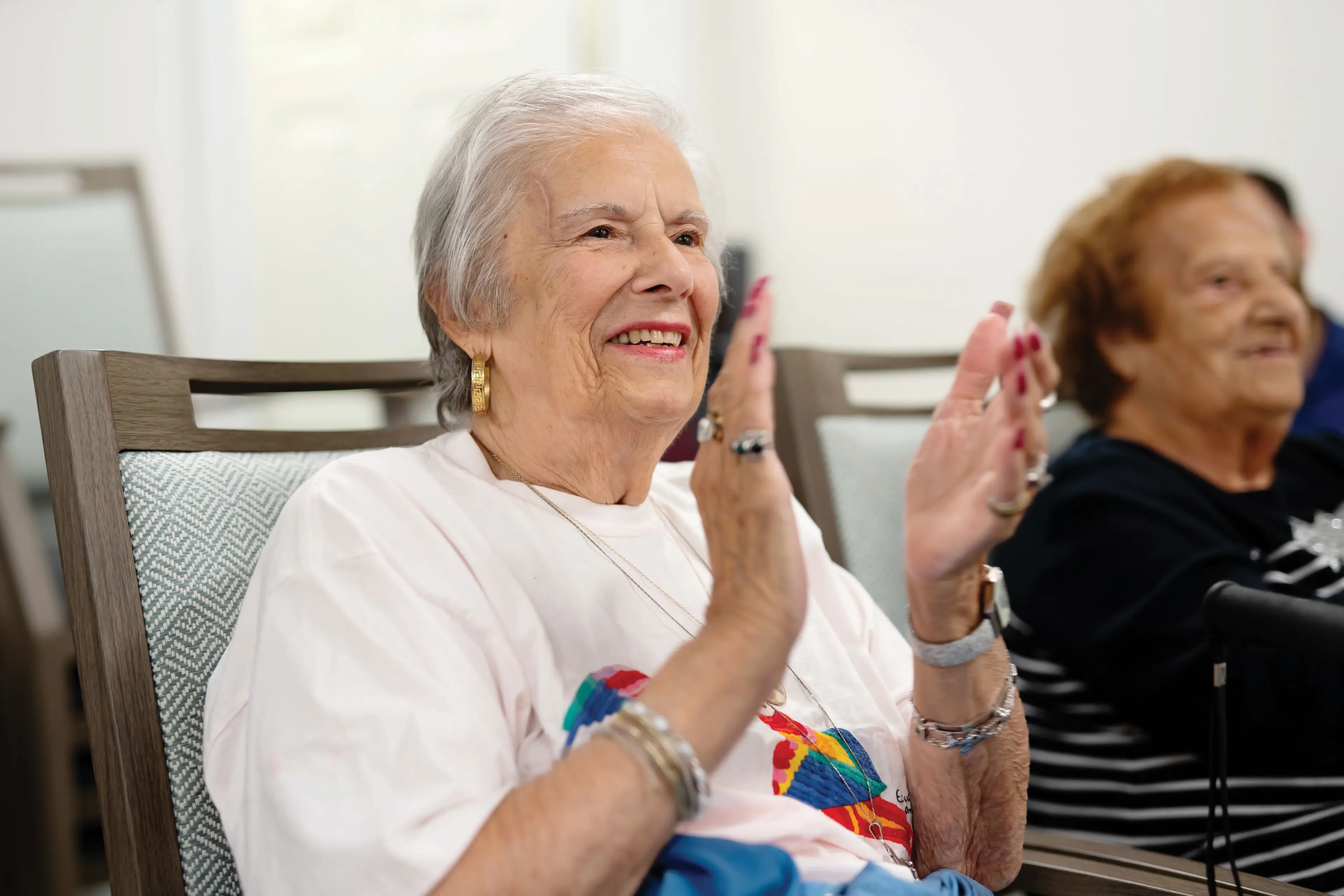 Monarch Tuckahoe resident applauding a performance