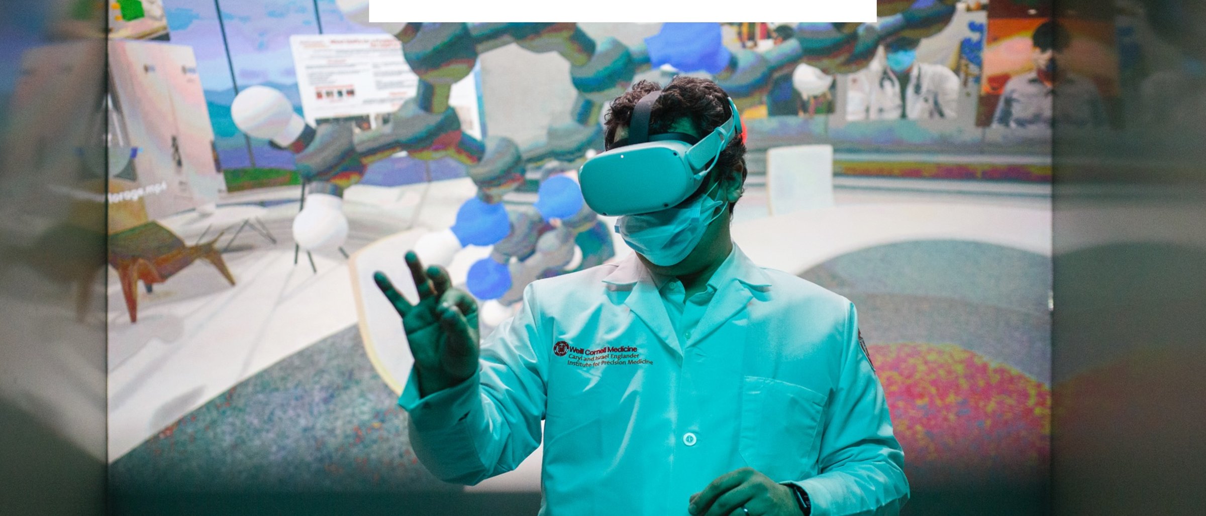 Alexandros Sigaras, director of the AI-XR Lab (artificial intelligence-extended reality) at Weill Cornell Medicine, attending a meeting in virtual reality (VR) with fellow researchers discussing precision medicine research on a specific protein structure. Image courtesy of Weill Cornell Medicine.