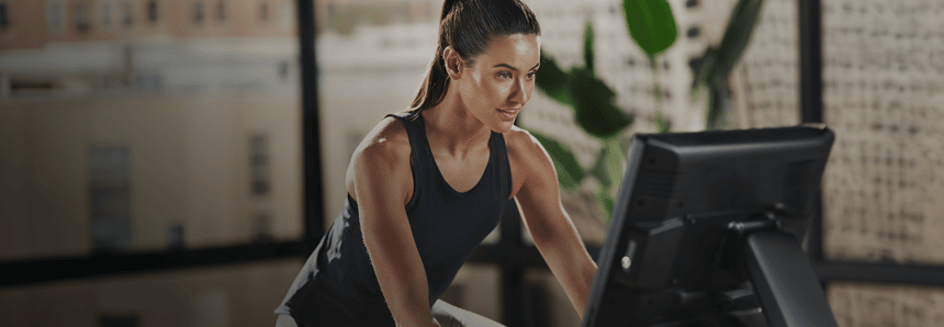 Athlete training on a Freemotion cardio machine
