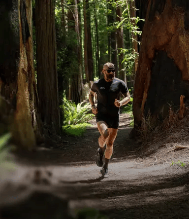 Runner training outdoors with iFIT