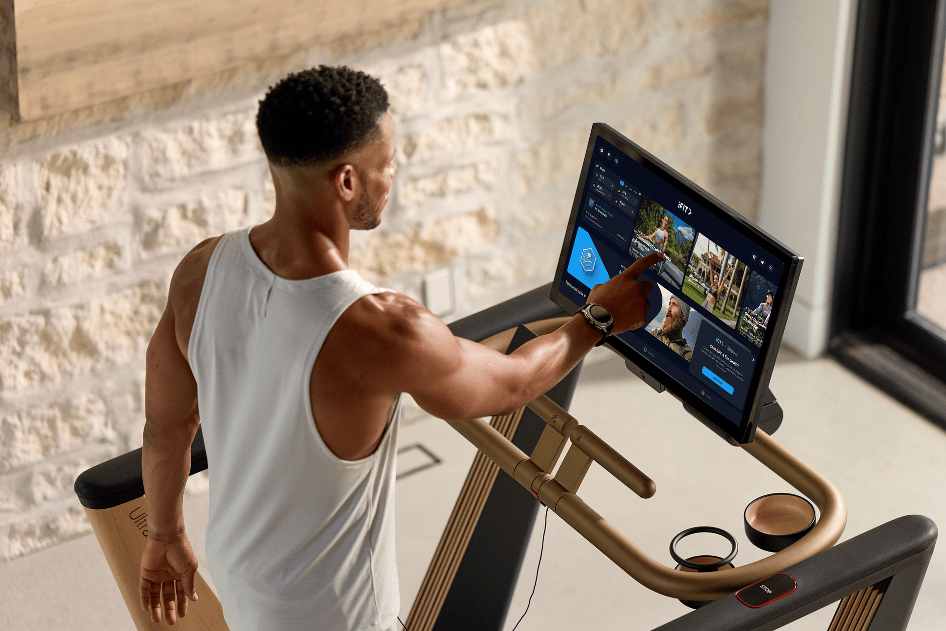 Member choosing an iFIT workout on a console