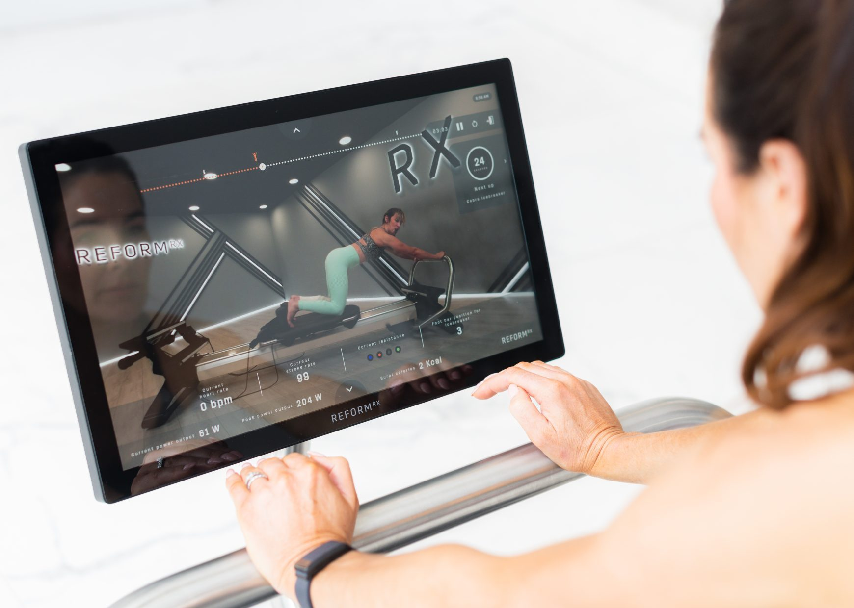 Sesión en pantalla táctil de iFIT Pilates