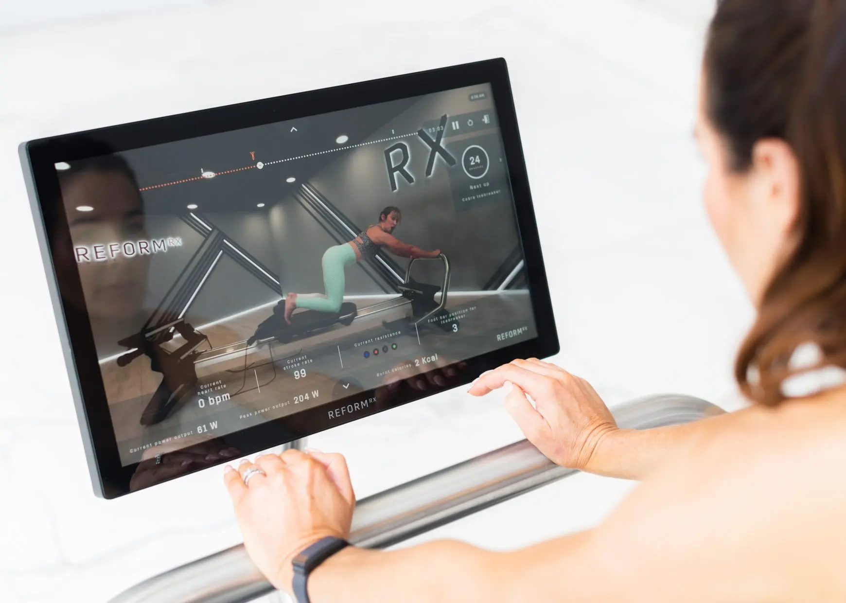 iFIT Pilates touchscreen session