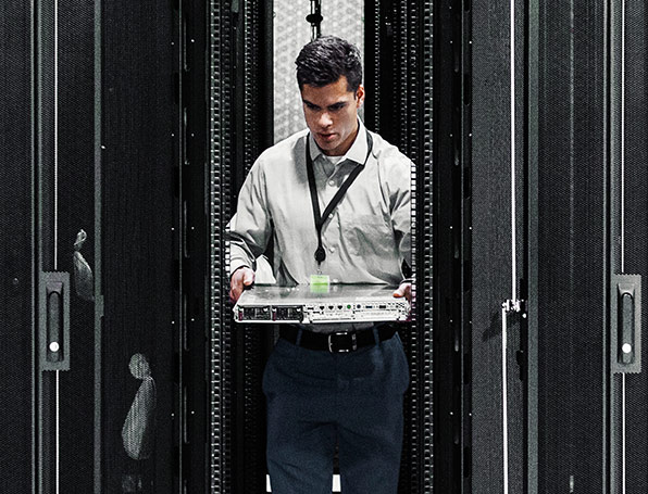 Sqre|Man installing a server into a server rack