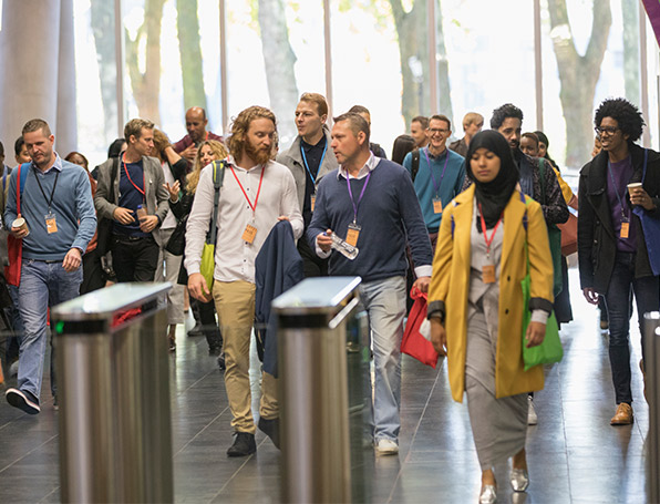 Sqre|A crowd of people entering venue