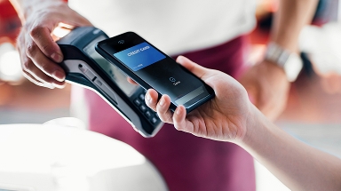 Card | Customer paying for goods with device wirelessly
