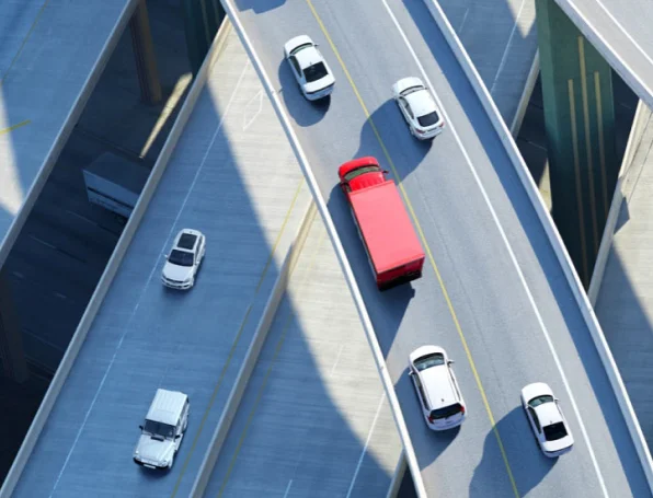 Sqre|Overhead view of cars and a red truck on the highway