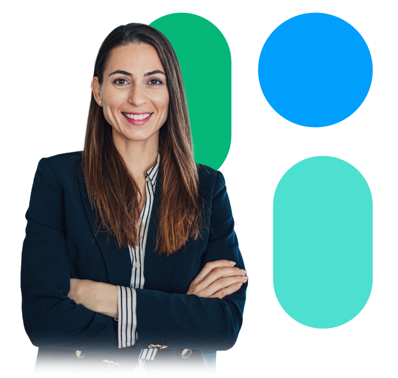A woman in a business suit standing with her arms crossed.