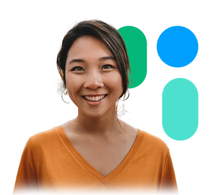 A smiling asian woman wearing an orange t - shirt.
