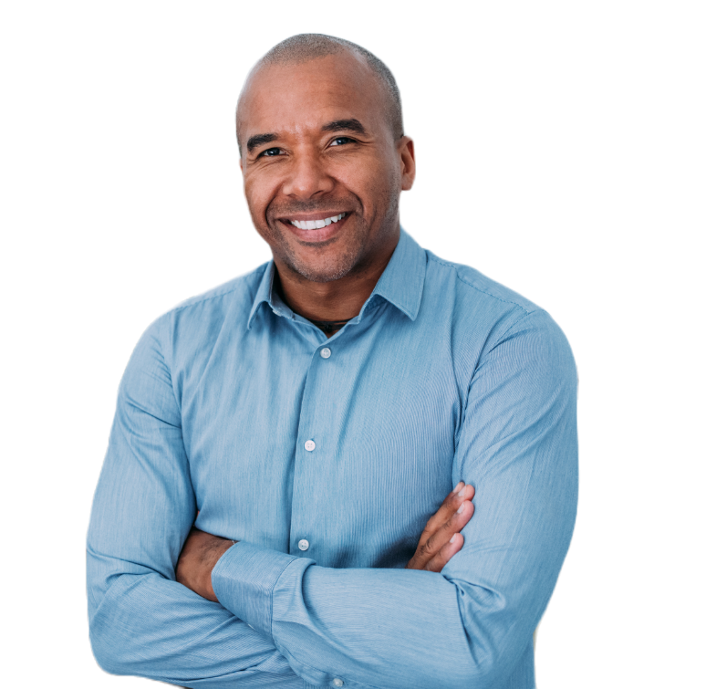 A smiling black man in a blue shirt.
