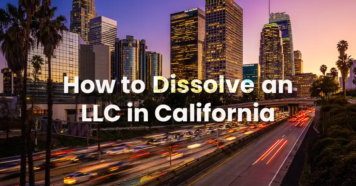 Downtown los angeles skyline at dusk with busy traffic, overlaid with text "how to dissolve an llc in california.