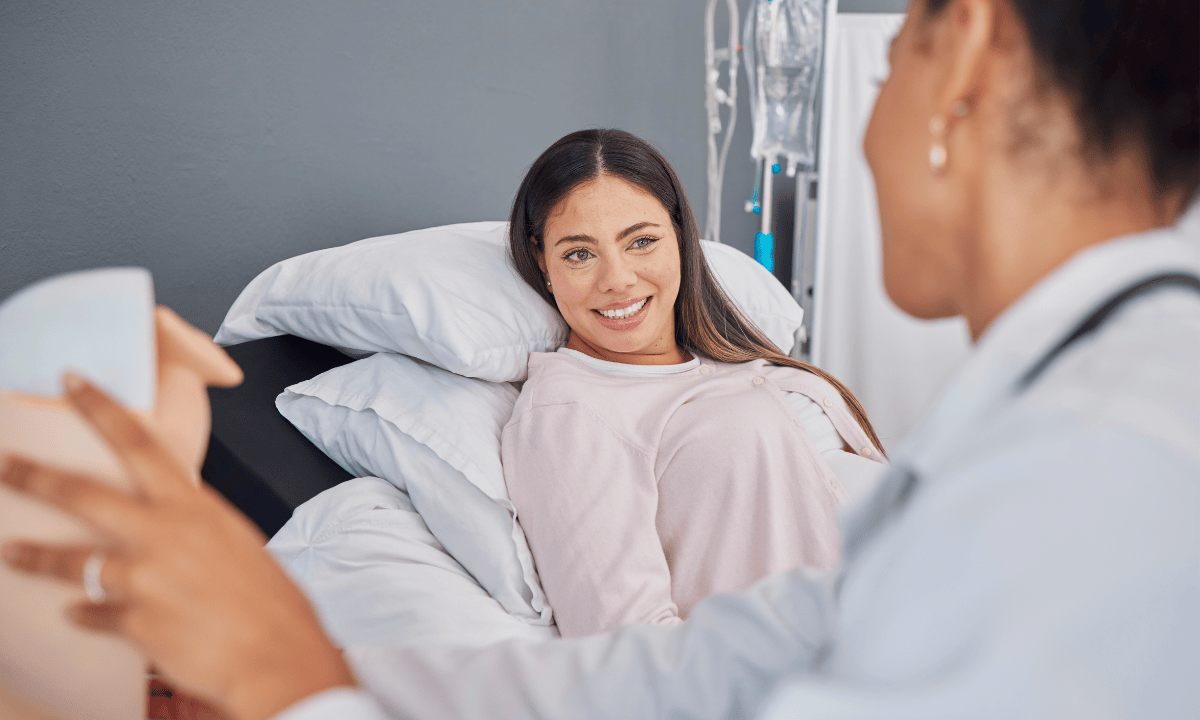 Image of a patient smiling with a doctor