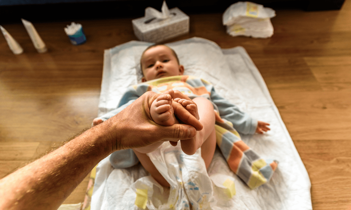 image of changing baby nappy