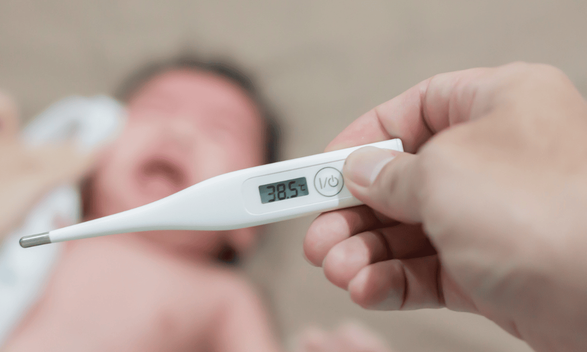 Image of a thermometer showing 38.5 degree