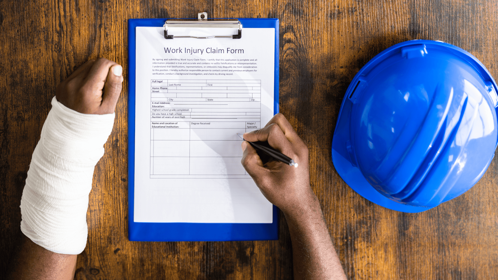 image of worker signing accident insurance