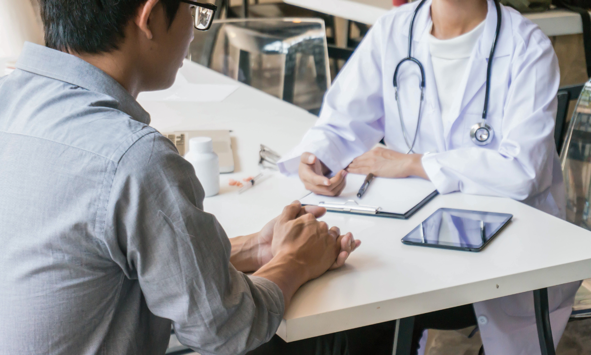 a man consulting with a doctor